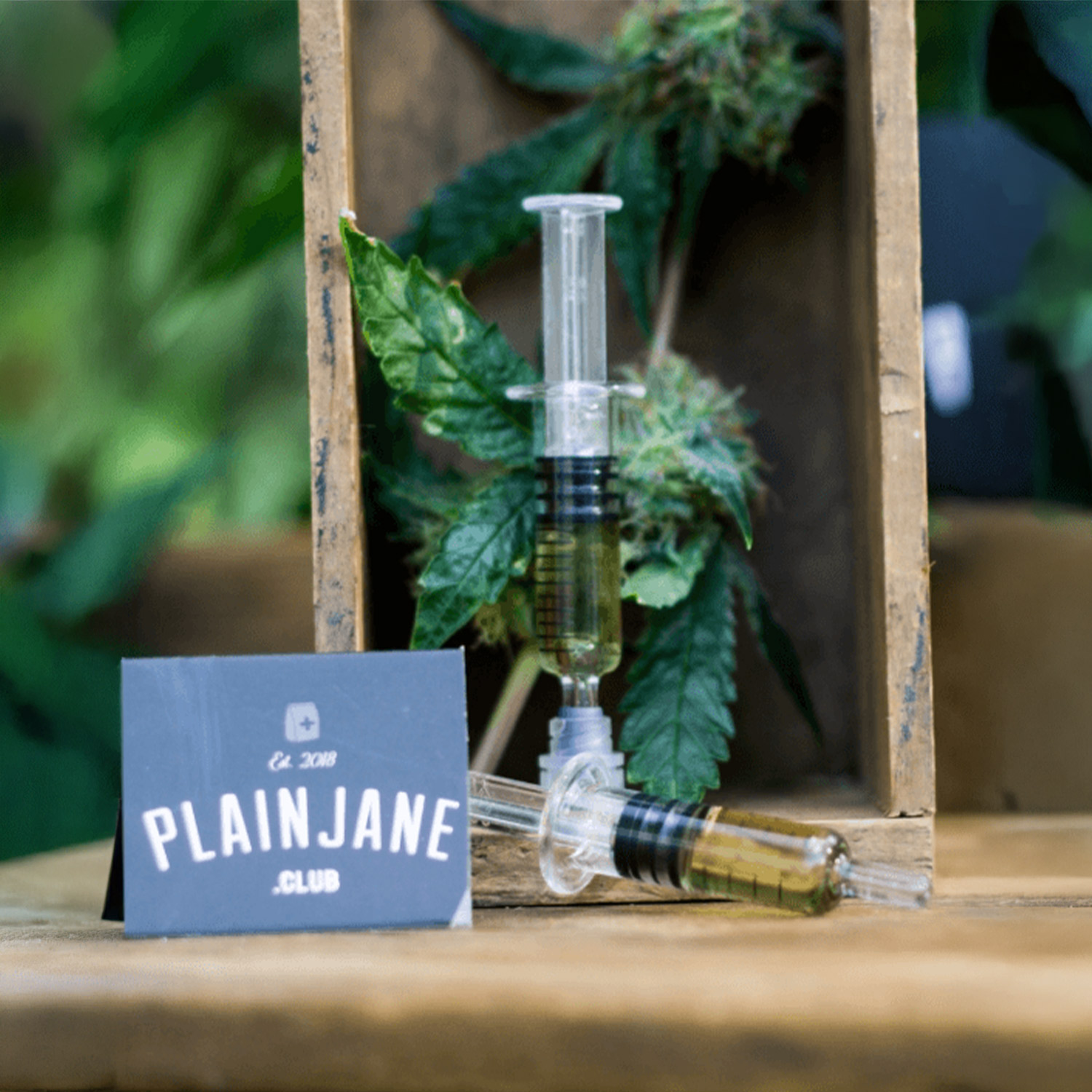 Vape Cartridge Connected To Glass Rig, Side View